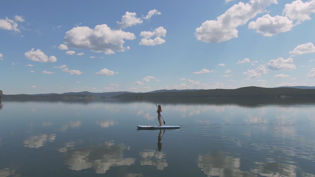 serene paddle surfing